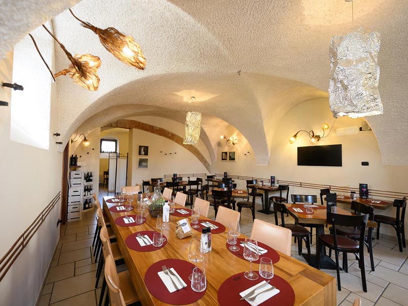 LCM S.A.S di Monfredini Massimo & C. | Al Fiume typisches Restaurant und Pizzeria im Zentrum von Arco, Gardasee